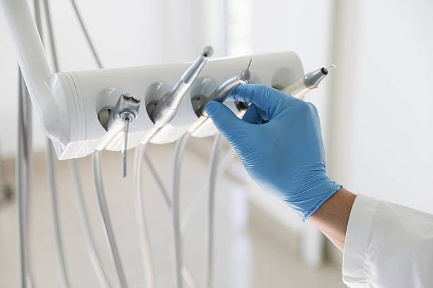 Professional Emergency Dentist technician working in Alma, AR